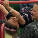 Ethan McCord and daughter Mikayla in a Wichita, Kansas playground, in a scene from the film.